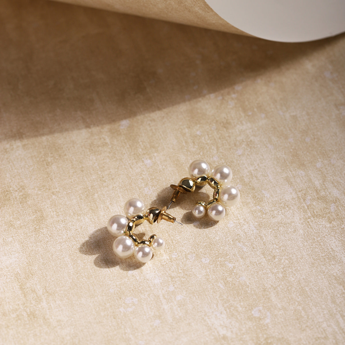 Gold-Toned & White Contemporary Drop Earrings